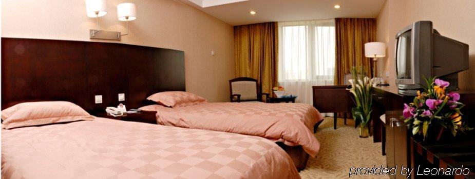 Ariva Beijing West Hotel Pequim Quarto foto